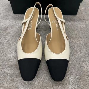 Classic two tone white and black slingback pump shoes